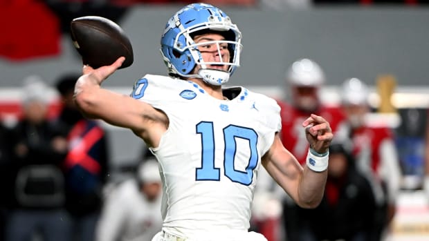 Nov 25, 2023; Raleigh, North Carolina, USA; North Carolina Tar Heels quarterback Drake Maye (10) throws a pass against the North Carolina State Wolfpack during the first half at Carter-Finley Stadium.